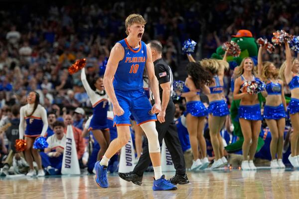 Florida's Thomas Haugh (10) celebrates after making a basket while being fouled against Auburn during the second half in the national semifinals at the Final Four of the NCAA college basketball tournament, Saturday, April 5, 2025, in San Antonio. (AP Photo/Eric Gay)
