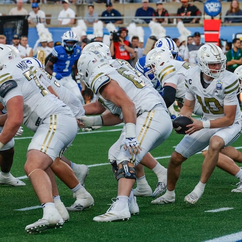 Georgia Tech quarterback Haynes King takes a snap during the first half of the Pop-Tarts Bowl NCAA college football game against BYU, Saturday, Dec. 27, 2025, in Orlando, Fla. (Kevin Kolczynski/AP)