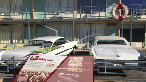The Lorraine Motel, where Martin Luther King  Jr. was killed April 4, 1968. The car on the left is a replica of the white Cadillac that R.S. Lewis had provided for King’s party during his stay in Memphis. (AP Photo/Beth J. Harpaz, File)
