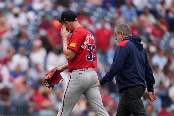 Braves pitcher AJ Smith-Shawver heads for the dugout during Game 1 of Atlanta's doubleheader in Philadelphia.