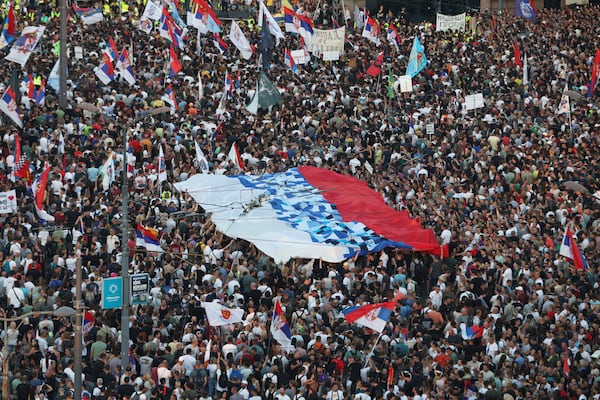 People attend a major anti-government rally in Belgrade, Serbia, Saturday, June 28, 2025. (AP Photo/Marko Drobnjakovic)