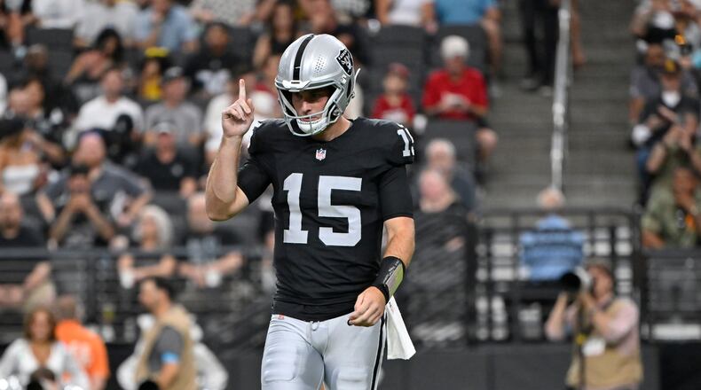 Las Vegas Raiders quarterback Fernando Mendoza (15) pauses on the field during the first half of a preseason NFL football game against the Arizona Cardinals, Thursday, Aug. 13, 2026, in Las Vegas. (AP Photo/David Becker)