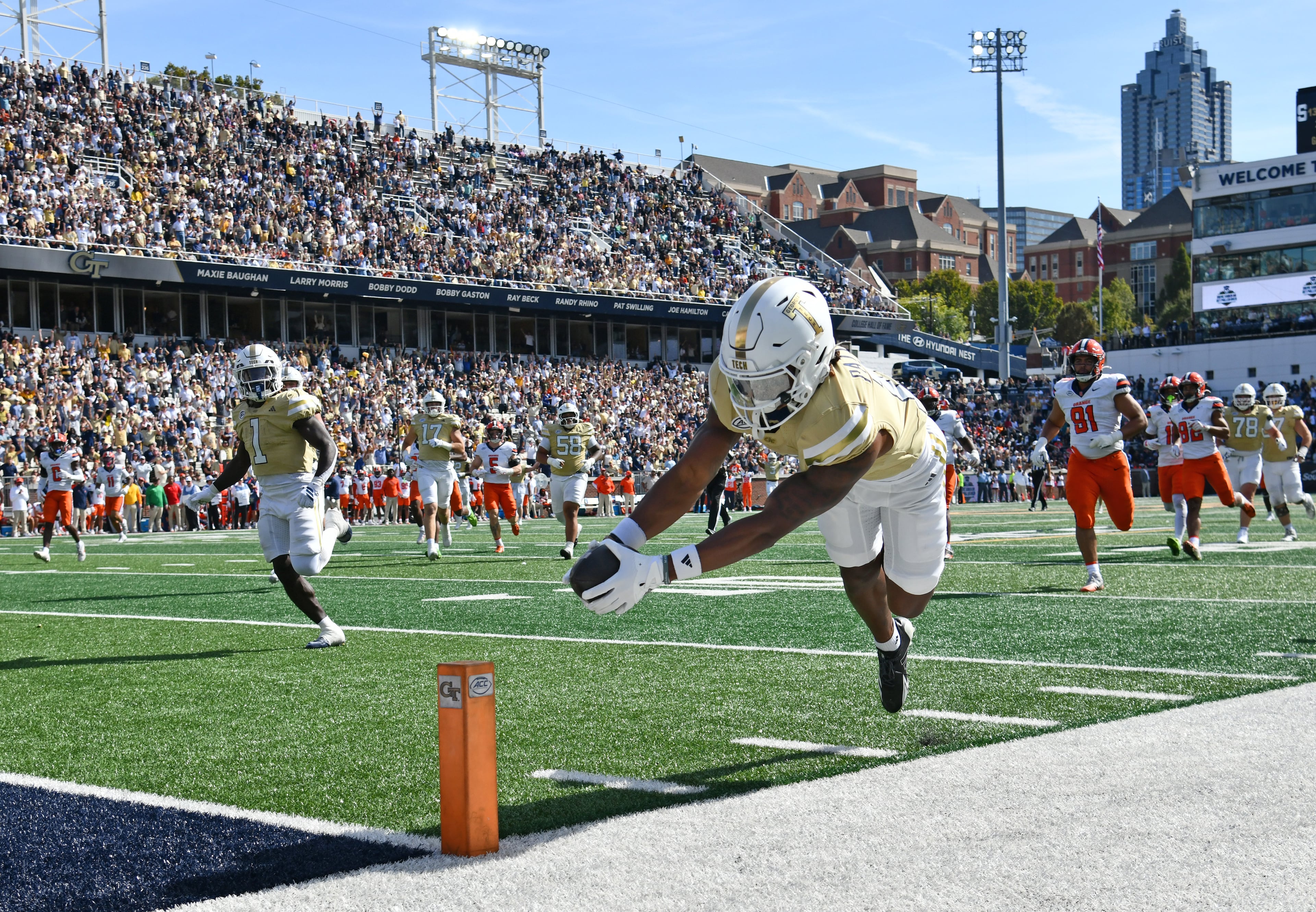 Georgia Tech wide receiver Dean Patterson dives into the end zone for a touchdown during the second half in an NCAA college football game at Bobby Dodd Stadium, Saturday, Oct. 25, 2025 in Atlanta. Georgia Tech won 41-16 over Syracuse. The Yellow Jackets are 8-0 for the first time since 1966 and 5-0 in the ACC for the first time ever. (Hyosub Shin/AJC)