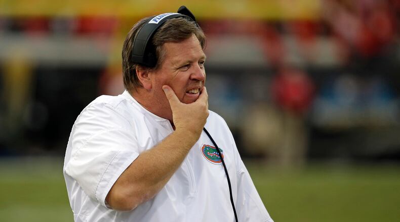 Florida head coach Jim McElwain walks the sideline in the second half against Georgia, Saturday, Oct. 28, 2017, in Jacksonville, Fla. Georgia won 42-7.