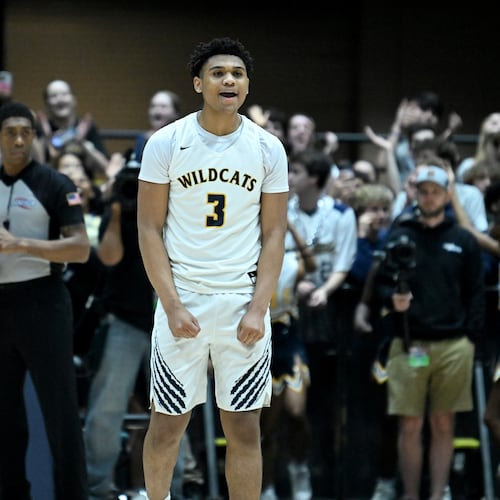 Wheeler's Colben Landrew — pictured reacting after making a free throw at the end of the Wildcats' 6A state championship game win in March over Newton — is back leading the team as Wheeler seeks its third title in four seasons. (Hyosub Shin/AJC 2025)