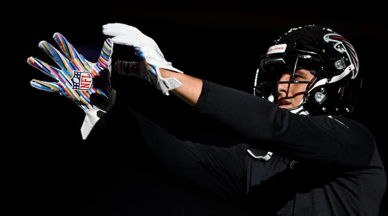 Falcons tight end Austin Hooper wears the Crucial Catch NFL gloves during warms up prior to the game Oct. 6, 2019, against the Texans at NRG Stadium in Houston.