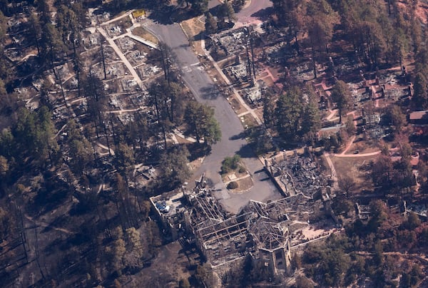 A view of the remains of the Grand Canyon Lodge during Arizona Gov. Katie Hobbs' aerial tour of the wildfire damage along the canyon's North Rim, Ariz., Saturday, July 19, 2025. (Joe Rondone/The Arizona Republic via AP, Pool)
