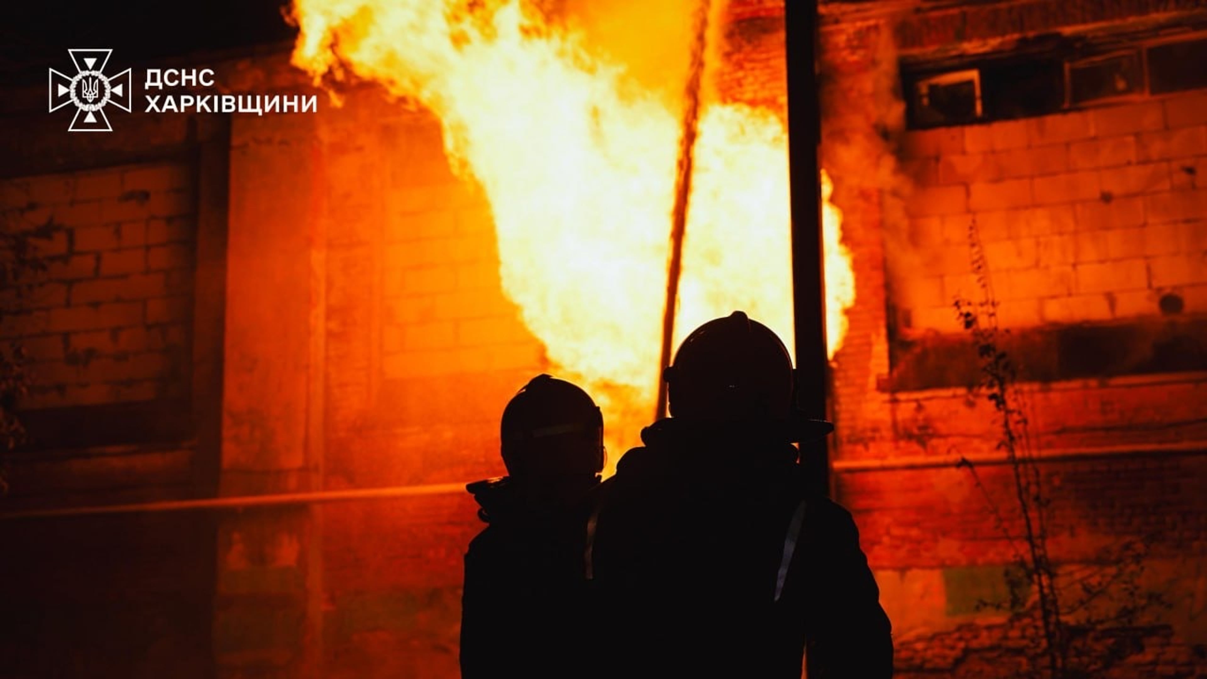 In this photo provided by the Ukrainian Emergency Services on Tuesday, Oct. 14, 2025, rescue workers put out a fire of a hospital damaged by a Russian strike in Kharkiv, Ukraine. (Ukrainian Emergency Service via AP)