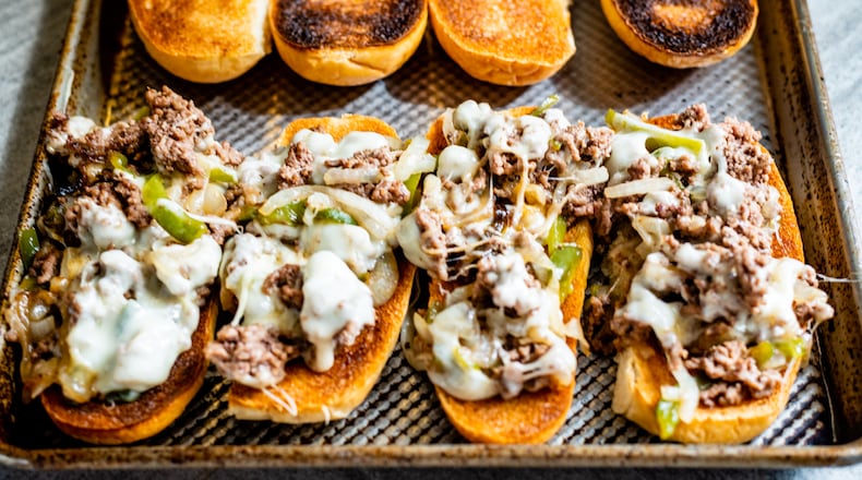 Weeknight Cheesesteaks don't have slices of steak, but you can still enjoy a beefy/cheesy taste. (Henri Hollis for The Atlanta Journal-Constitution)