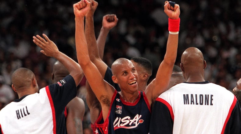 Reggie Miller, of the U.S. men's basketball Dream Team, celebrates after the Team U.S. gold medal win Saturday, Aug. 3, 1996, during the 1996 Summer Olympic Games in Atlanta. (Allen Eyestone/Cox)