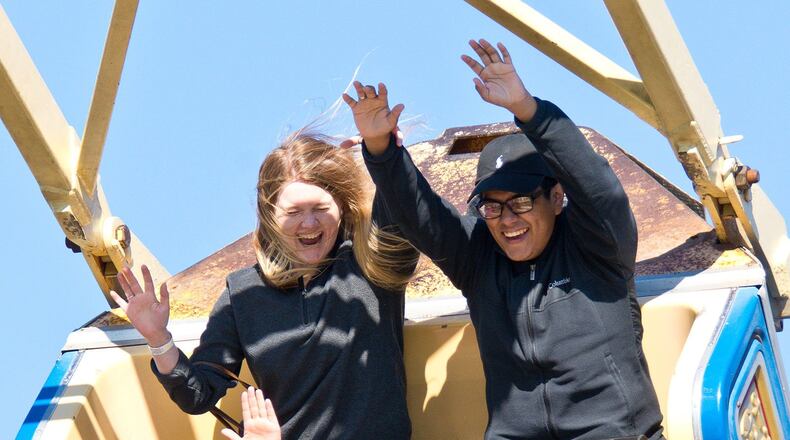Courtney Schumann and Nesto Lovato enjoy the Pharaoh’s Fury ride at The Mighty Thomas Carnival on Saturday. The carnival continues at Dell Diamond through Saturday. Henry Huey photo for the Leader
