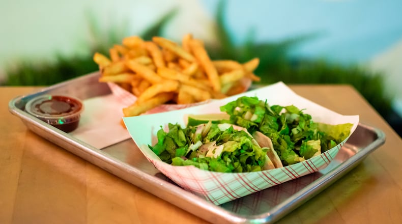 The top-line menu item at Yumbii is the delicious Asian Rib-Eye Beef with Korean chili sauce and soy-sesame vinaigrette. CONTRIBUTED BY HENRI HOLLIS