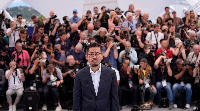 Director Na Hong-jin poses for photographers at the photo call for the film 'Hope' during the 79th international film festival, Cannes, southern France, Monday, May 18, 2026. (AP Photo/John Locher)