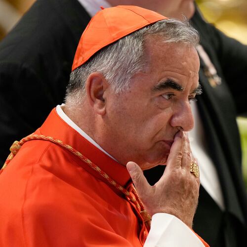 FILE - Cardinal Angelo Becciu attends the consistory inside St. Peter's Basilica at the Vatican, Aug. 27, 2022. (AP Photo/Andrew Medichini, File)