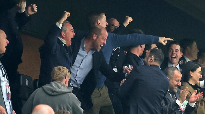 Britain's Prince William, center, celebrates as he watches the Europa League final soccer match between Freiburg and Aston Villa in Istanbul, Turkey, Wednesday, May 20, 2026. (AP Photo)