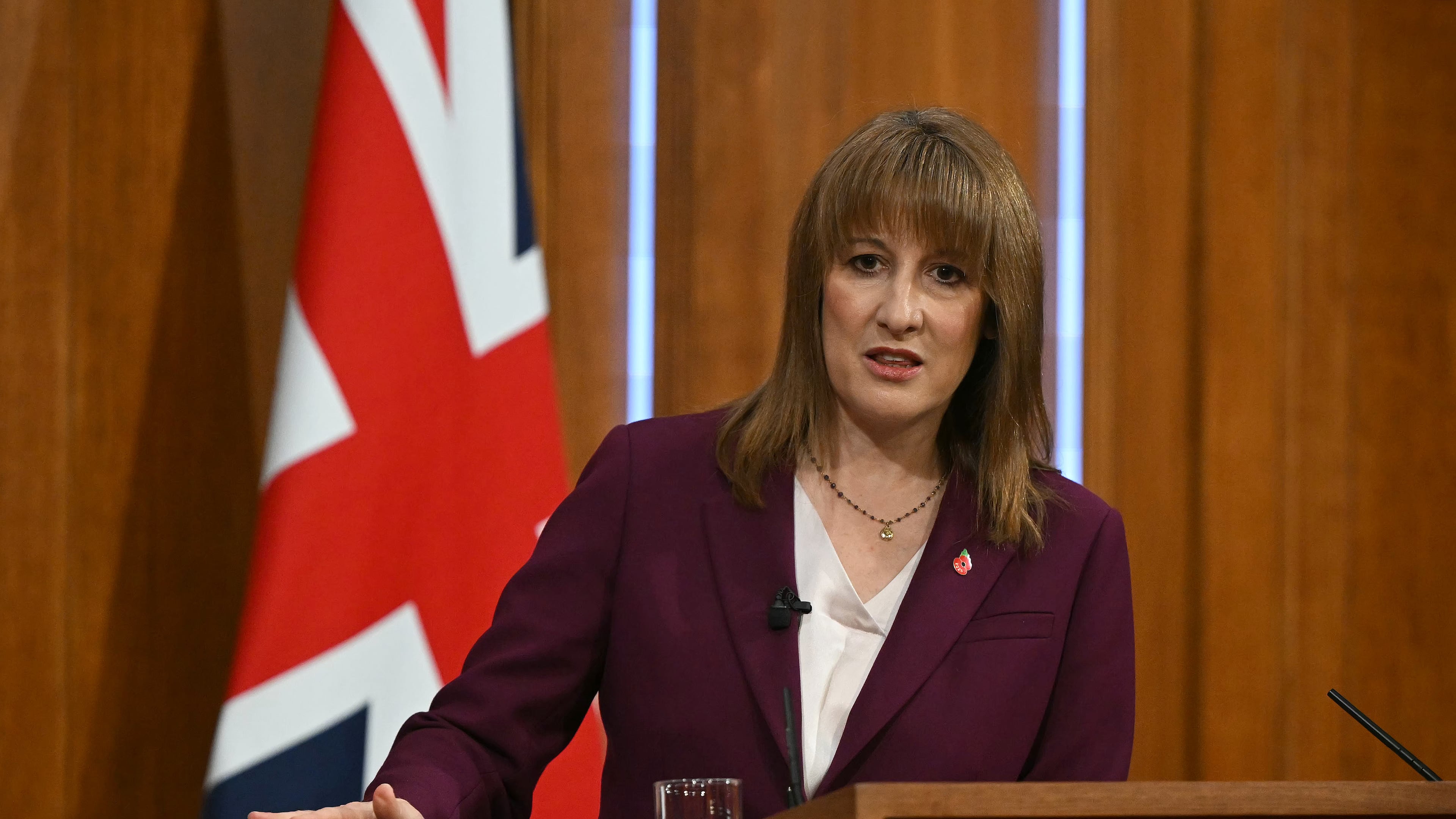 Britain's Chancellor of the Exchequer Rachel Reeves takes journalists' questions after delivering a speech in the media briefing room of 9 Downing Street, London, Tuesday Nov. 4, 2025. (Justin Tallis/Pool Photo via AP)