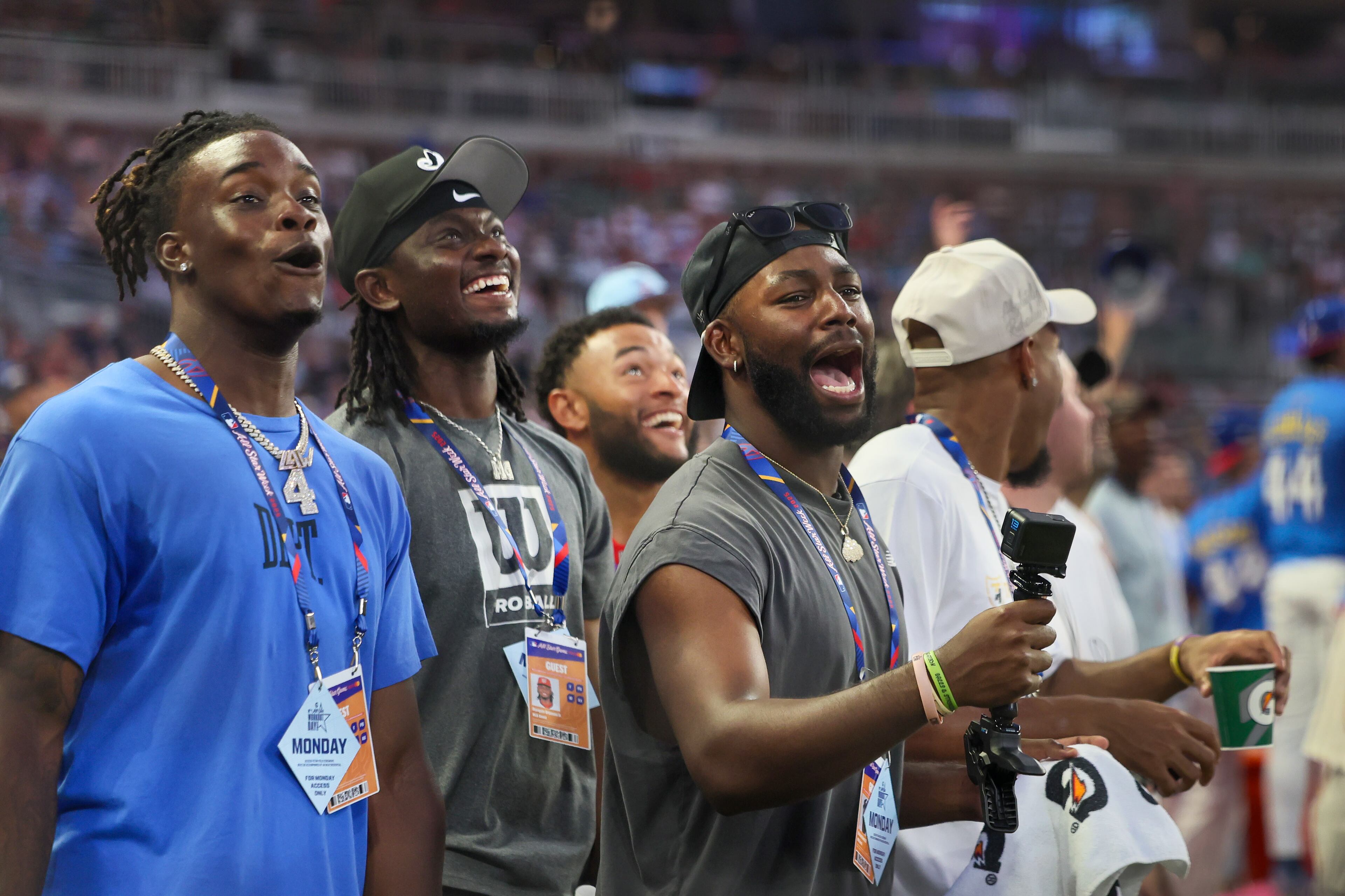 Atlanta Braves' Michael Harris (R) reacts after a home run by Pittsburgh Pirates shortstop Oneil Cruz during the MLB Home Run Derby as part of the All-Star Game festivities on Monday, July 14, 2025 at Truist Park in Atlanta. Jason Getz / AJC
