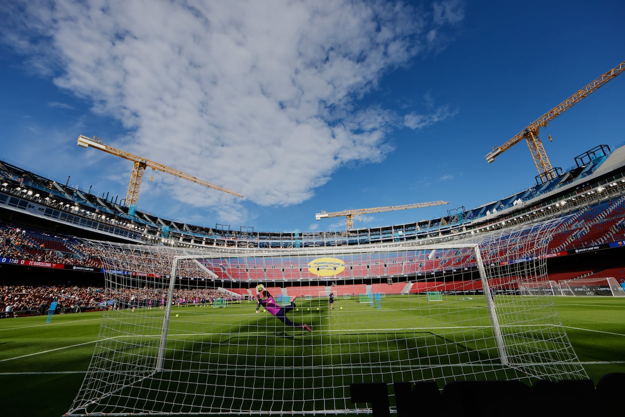 Barcelona's players exercise during the team's first training session at the venue after its renovation at the Camp Nou stadium in Barcelona, Spain, Friday, Nov. 7, 2025. (AP Photo/Joan Monfort)