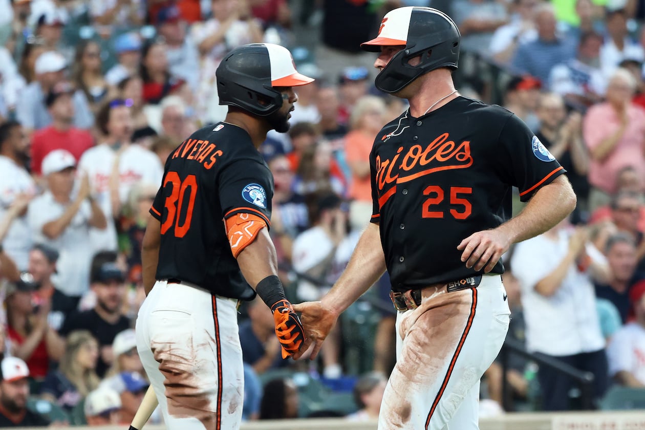 Baltimore Orioles' Pete Alonso celebrates with Baltimore Orioles' Leody Taveras after scoring a run during the third inning of a baseball game against the Atlanta Braves, Saturday, July 25, 2026, in Baltimore. (AP Photo/Daniel Kucin Jr.)