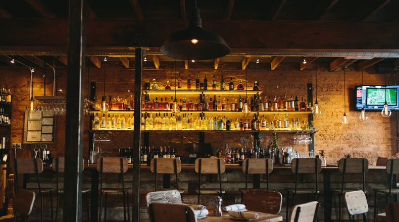 South Main Kitchen draws on the restaurant design du jour with reclaimed wood touches throughout. CONTRIBUTED BY CHRISTINA DEVICTOR