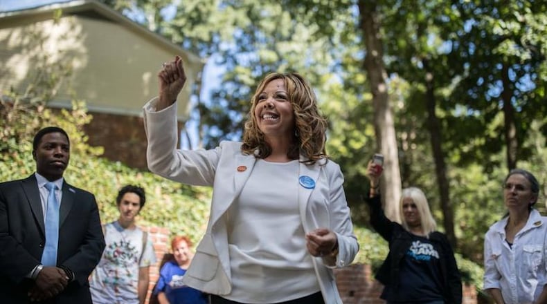 U.S. Rep. Lucy McBath could benefit from another round of redistricting if a federal judge rules in favor of plaintiffs challenging Georgia's Republican-drawn political maps.