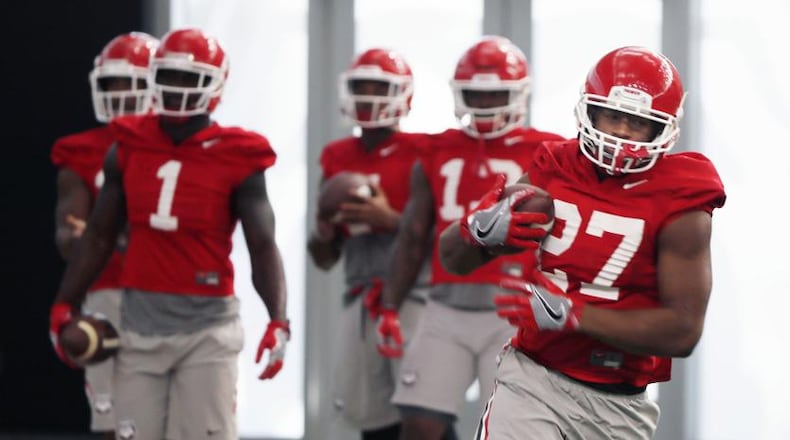 Georgia Bulldogs running back Nick Chubb, No. 27 during practice in Athens Saturday. AJC photo: Bob Andres