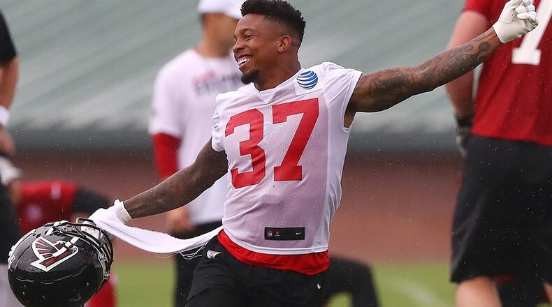 Falcons safety Ricardo Allen reacts after the defense intercepts the offense during the second day of practice at training camp on Tuesday, July 23, 2019, in Flowery Branch. Curtis Compton/ccompton@ajc.com