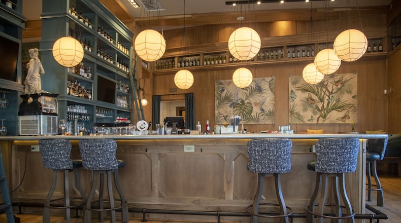 Sets of bar stools are positioned 6 feet apart in the bar room at the Select restaurant and bar in Sandy Springs, Thursday, May 7, 2020. ALYSSA POINTER / ALYSSA.POINTER@AJC.COM