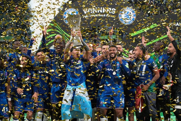 Chelsea's Enzo Fernandez lifts the trophy after the Europa Conference League final soccer match between Real Betis and Chelsea in Wroclaw, Poland, Wednesday, May 28, 2025. (AP Photo/Czarek Sokolowski)