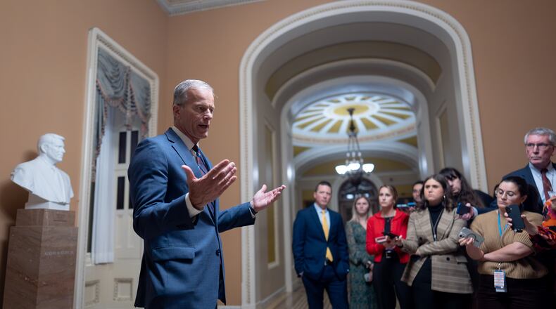 Senate Majority Leader John Thune, R-S.D., speaks to reporters after final Senate passage of the stopgap funding bill to reopen the government through Jan. 30, at the Capitol in Washington, Monday evening, Nov. 10, 2025. (AP Photo/J. Scott Applewhite)