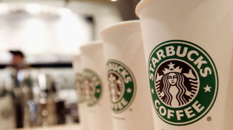 A Florida woman was awarded just over $100,000 in damages after hot coffee spilled on her lap in the drive-through of a Jacksonville Starbucks. (Photo by Stephen Chernin/Getty Images)