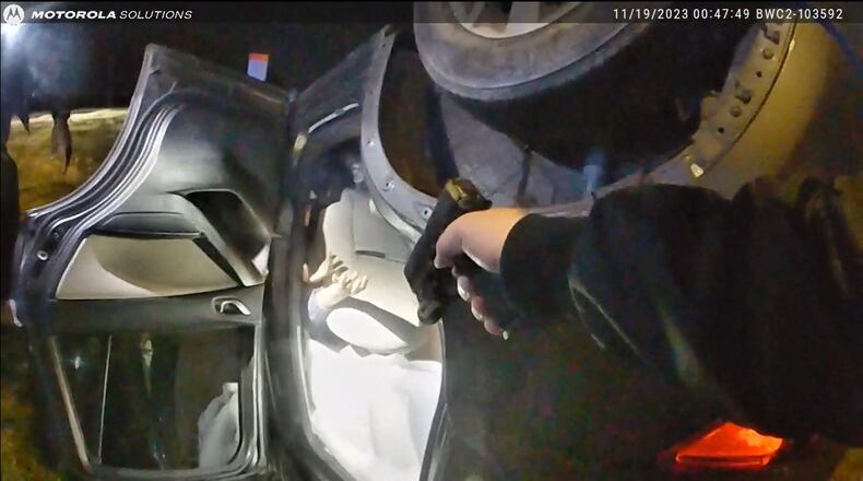 A screenshot of the body camera footage of an officer who shot and injured a man in Douglas County shows Cameron Hunt raising his hands.