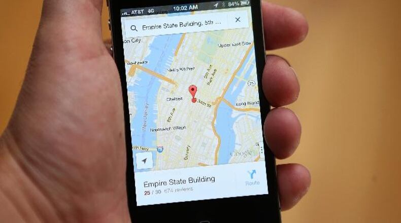 The Google Maps app is seen on an Apple iPhone 4S on December 13, 2012 in Fairfax, California.