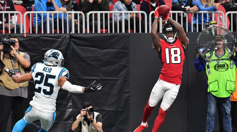Falcons wide receiver Calvin Ridley catches a touchdown pass in the corner of the end zone during the Dec. 8 game against Carolina. (Hyosub Shin/Hyosub.Shin@ajc.com)