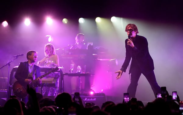 FILE - Jarvis Cocker, right, and Mark Webber, from left, and Candida Doyle, of the band Pulp, performs at the Hollywood Palladium in Los Angeles on Sept. 18, 2024, (AP Photo/Chris Pizzello, File)