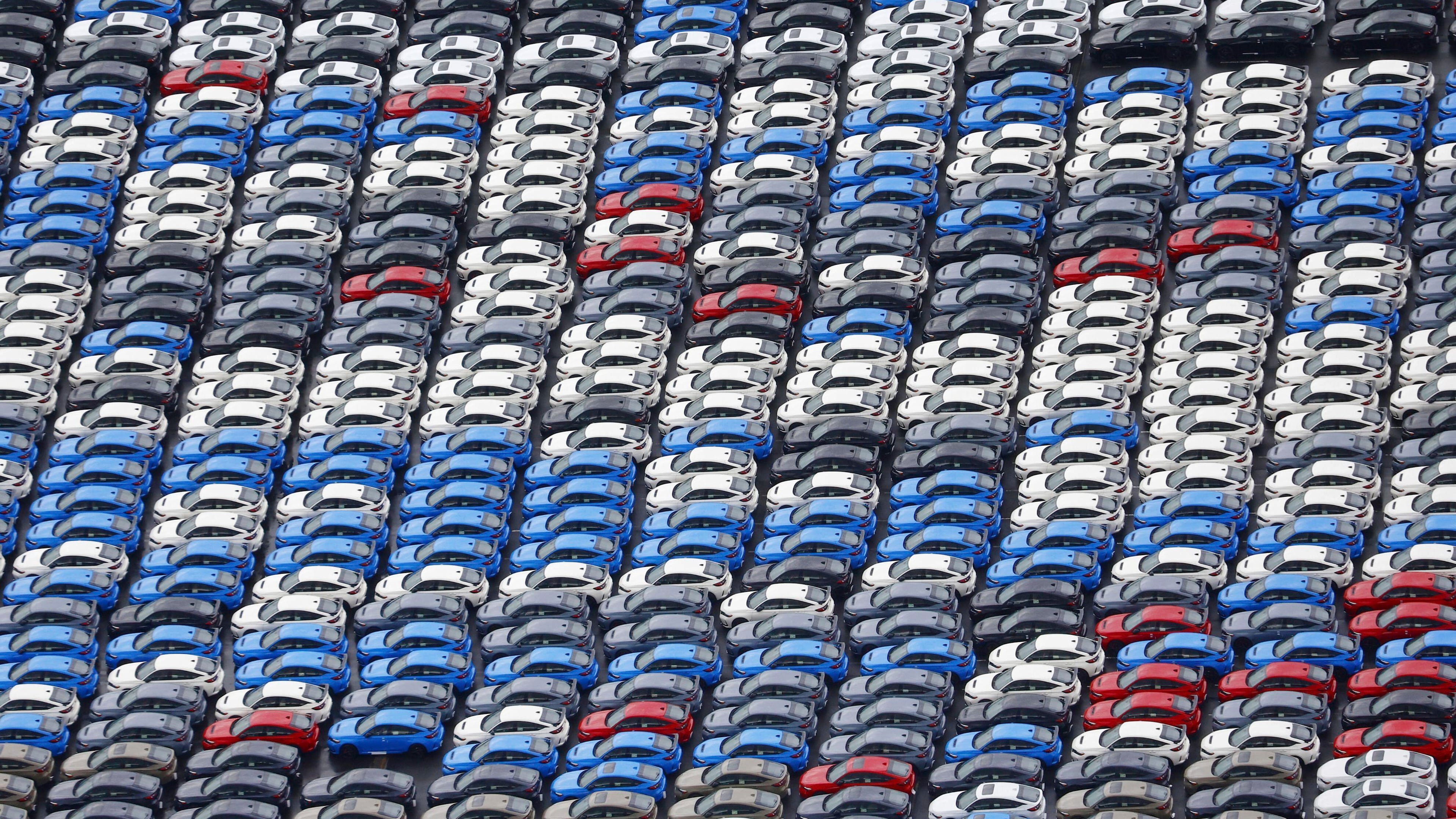 Vehicles are parked for export at a Yokohama port, near Tokyo on Aug. 1, 2025. (Takuto Kaneko/Kyodo News via AP)