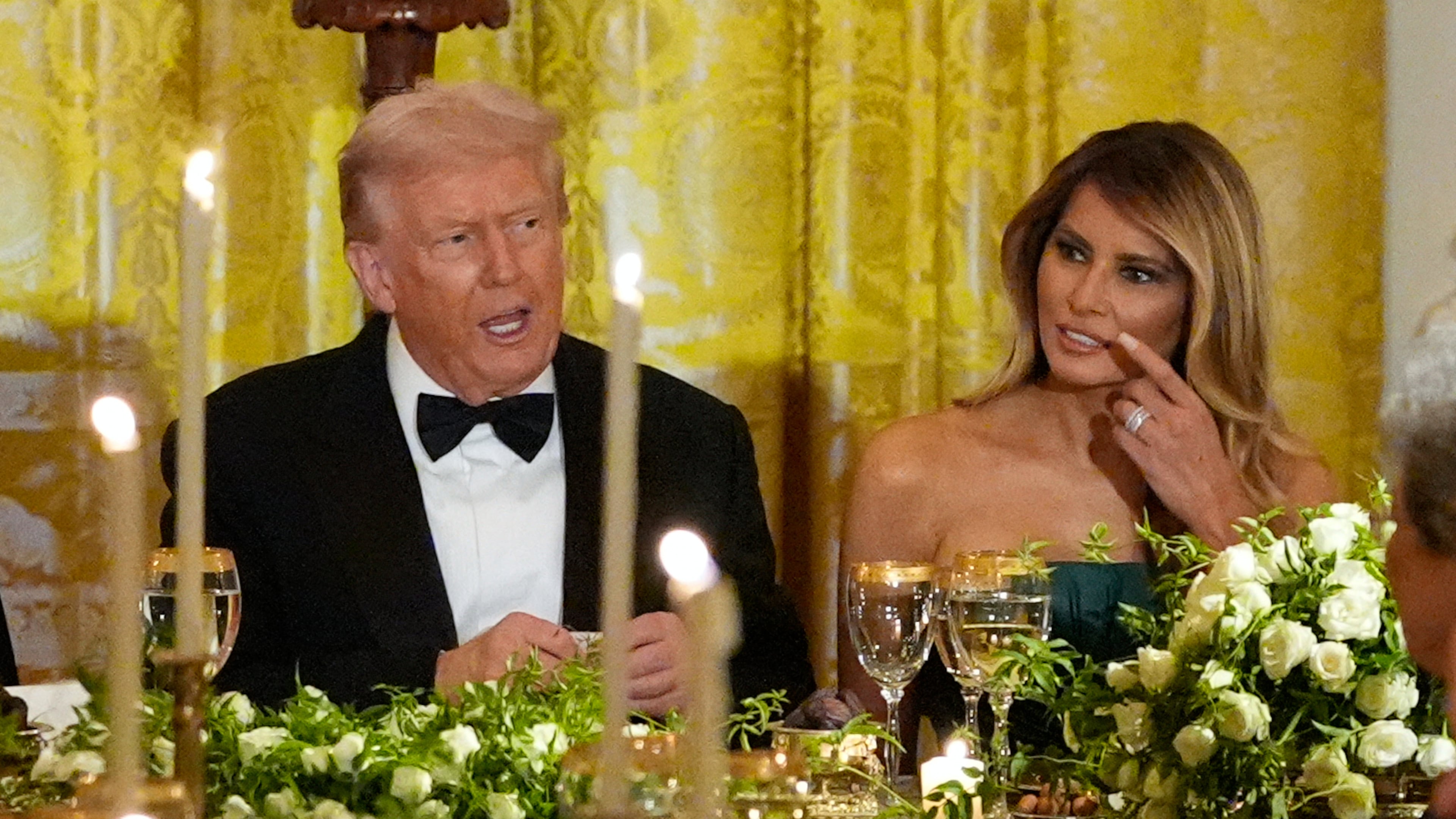 President Donald Trump and first lady Melania Trump attend a dinner with Saudi Arabia's Crown Prince Mohammed bin Salman in the East Room of the White House, Tuesday, Nov. 18, 2025, in Washington. (AP Photo/Alex Brandon)