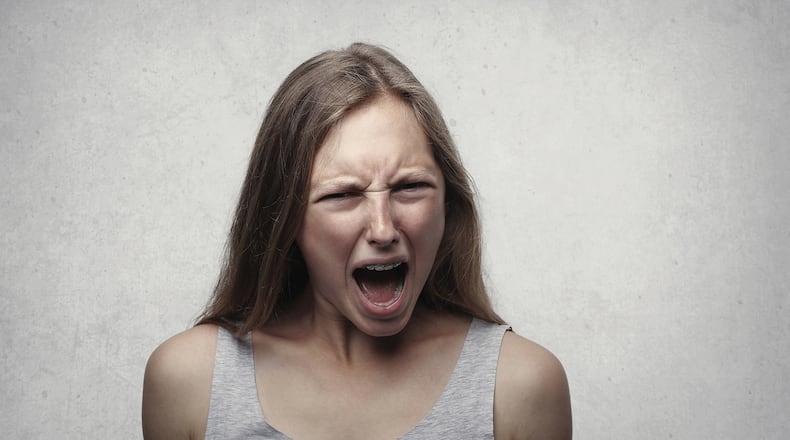 Photo illustration. Growling, yelilng, stress, anger. Credit: PEXELS