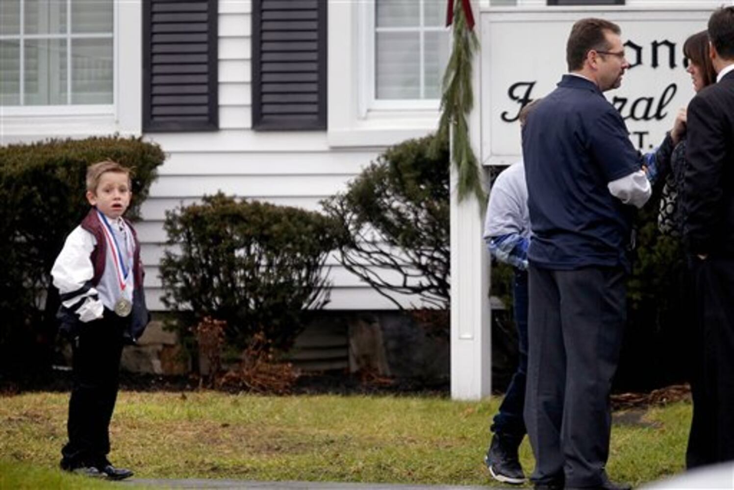 Newtown holds the first funerals for the victims