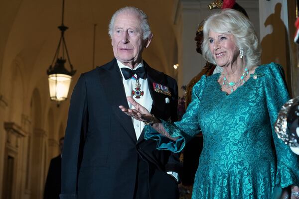 King Charles III and Queen Camilla arrive for for an official dinner withItal y's President Sergio Mattarella at the Quirinale Presidential Palace in Rome, Wednesday, April 9, 2025. (AP Photo/Andrew Medichini)
