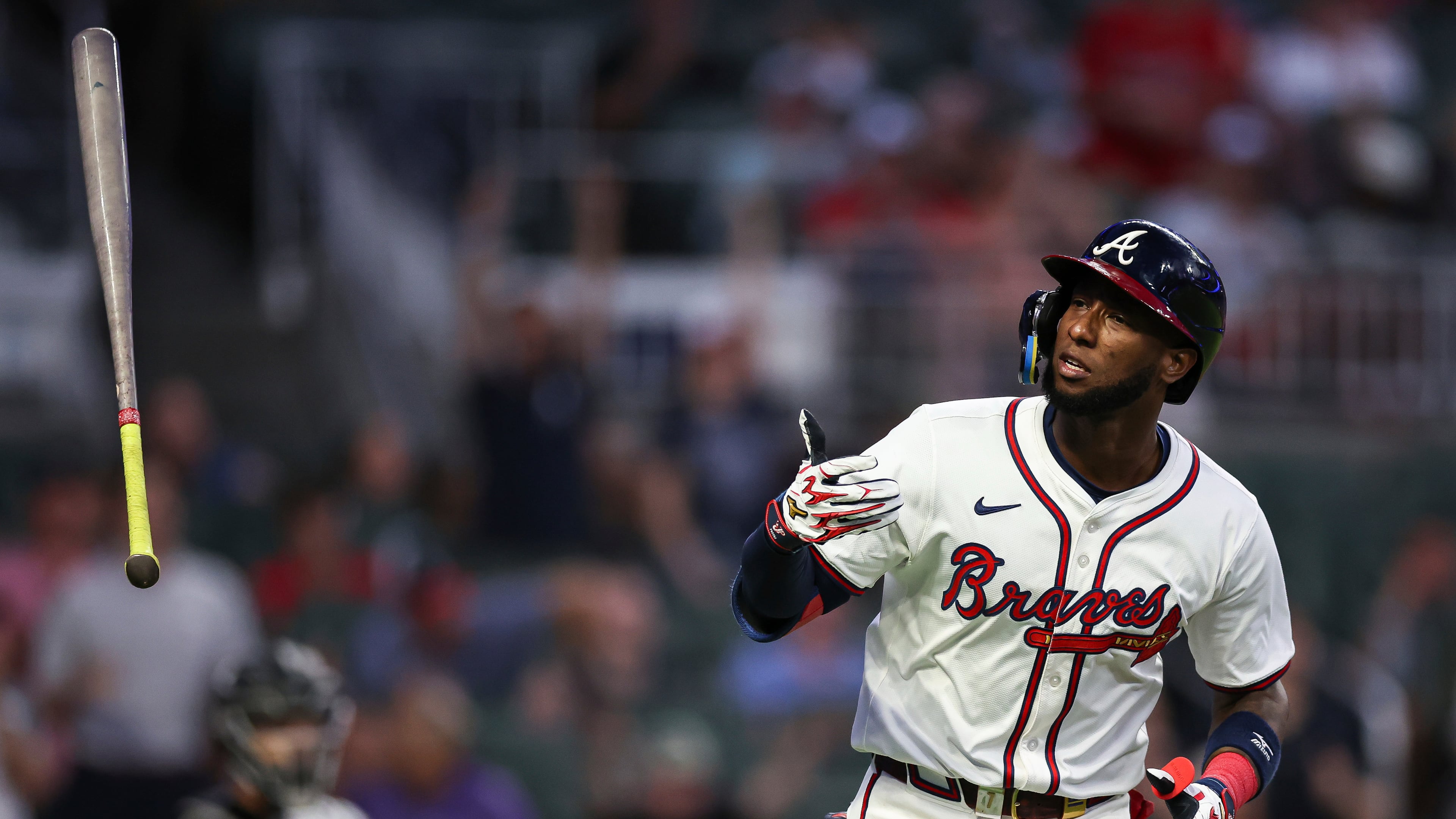 Atlanta Braves' Jurickson Profar flips his bat after hitting a two-run home run in the fourth inning of a baseball game against the Chicago White Sox, Tuesday, Aug. 19, 2025, in Atlanta. (AP Photo/Colin Hubbard)