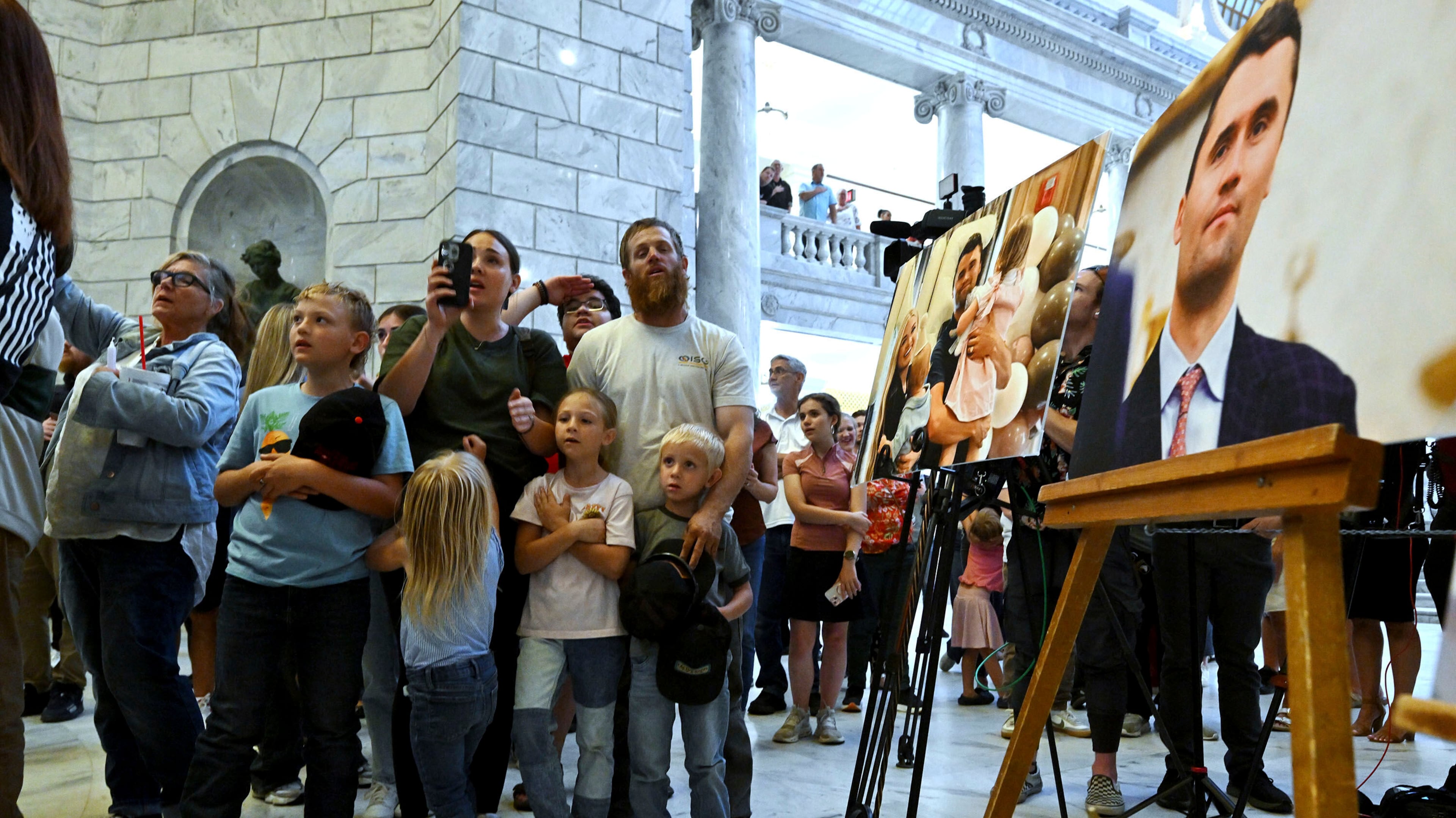 Members of the community gather at the Capitol in Salt Lake City to honor Charlie Kirk after he was shot at an event at Utah Valley University and later died at a local hospital, on Wednesday, Sept. 10, 2025. (Scott G Winterton/The Deseret News via AP)