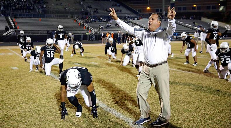 Norcross head coach Keith Maloof gets the team ready for a 2016 game against Lowndes.