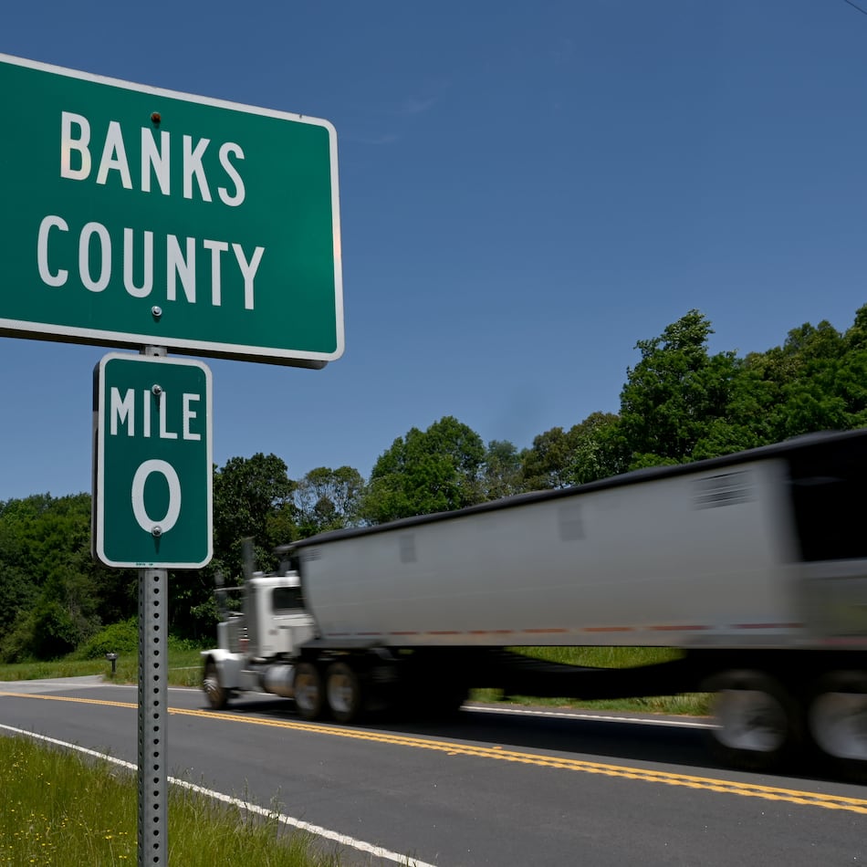 Banks County 0 mile sign is displayed on Old Federal Road, Wednesday, May 21, 2025, in Carnesville. The boundary between Banks and Franklin mysteriously moved to the east, allowing the Banks sheriff to claim he lives in the county and keep his job as the top lawman. (Hyosub Shin / AJC)