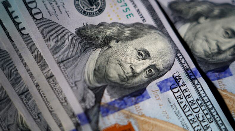 FILE - A portrait of Benjamin Franklin is displayed on U.S. $100 bills in Pennsylvania, on July 14, 2022. (AP Photo/Matt Slocum, File)