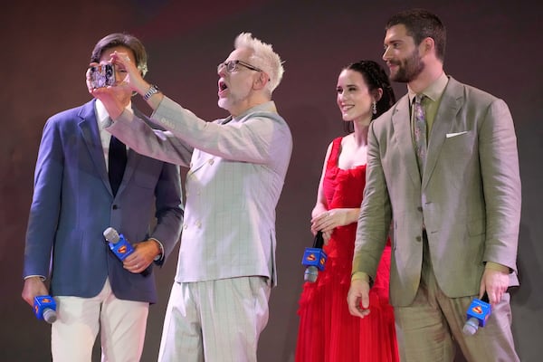 Director James Gunn (second from left) takes a video with producer Peter Safran (from left) and actors Rachel Brosnahan and David Corenswet during the first stop of the Superman World Tour in Pasay, Philippines, on Thursday June 19, 2025. (Aaron Favila/AP)