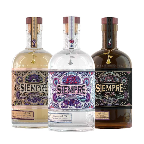 Spice up the holidays with spirits distilled in the small town of Tequila, Mexico. Plata, reposado and añejo expressions are dressed up with a rose charm. Courtesy of Siempre Tequila