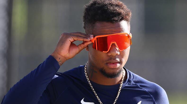 031822 North Port: Atlanta Braves Ronald Acuna puts on his sunglasses while getting in some early morning batting practice during Spring Training on Friday, March 18, 2022, before playing the Minnesota Twins in a MLB preseason game in North Port.    “Curtis Compton / Curtis.Compton@ajc.com”