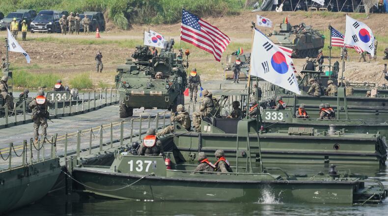 FILE - A vehicle from U.S. Army's the Stryker Combat Team crosses a floating bridge on the Namhan River during the combined river-crossing drill between South Korea and the United States as a part of the Ulchi Freedom Shield 25 in Yeoju, South Korea, Aug. 27, 2025. (AP Photo/Lee Jin-man, File)