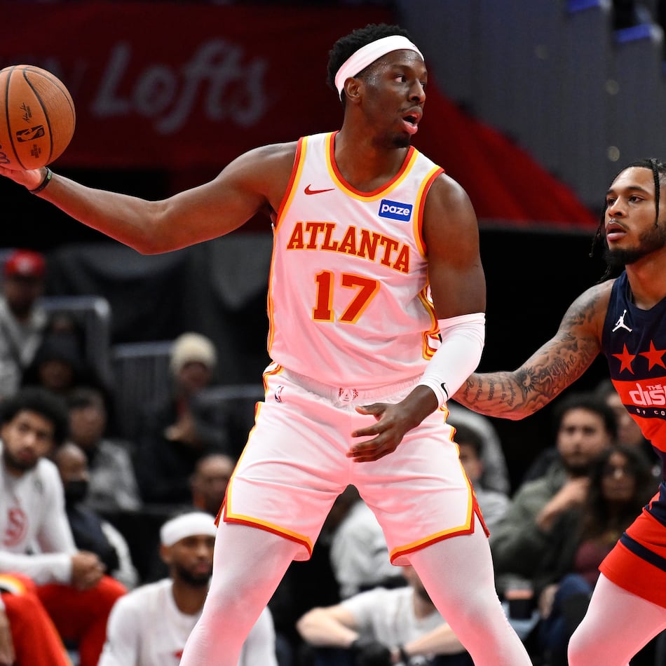Atlanta Hawks forward Onyeka Okongwu is guarded by Washington Wizards forward Cam Whitmore during the first half of a Emirates NBA Cup basketball game Tuesday. (John McDonnell/AP)
